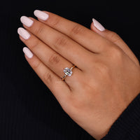 Old mine cut diamond in solitaire yellow gold setting.
