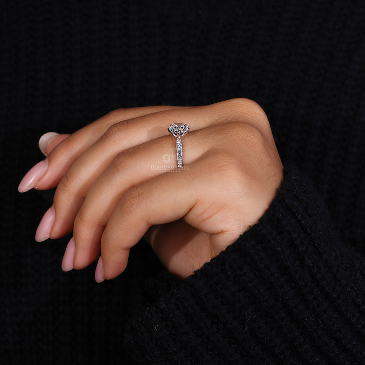 White gold diamond ring with a claw prong setting.
