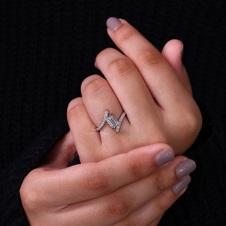 But engagement ring with prong setting and handcrafted white gold band.
