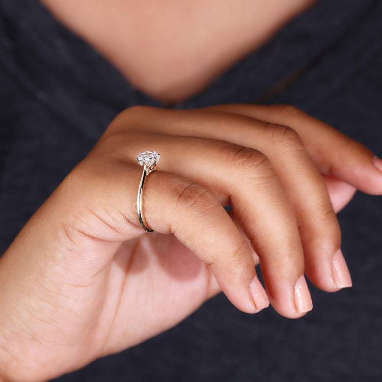Buy Engagement ring with cathedral setting design.
