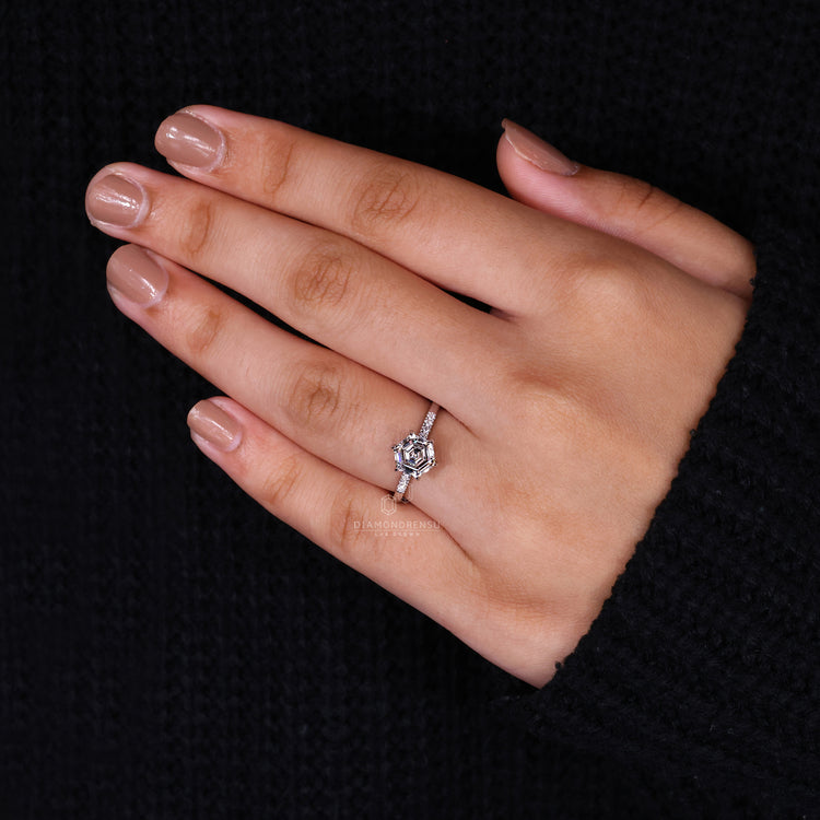 6 claw prong setting on hexagon engagement ring.
