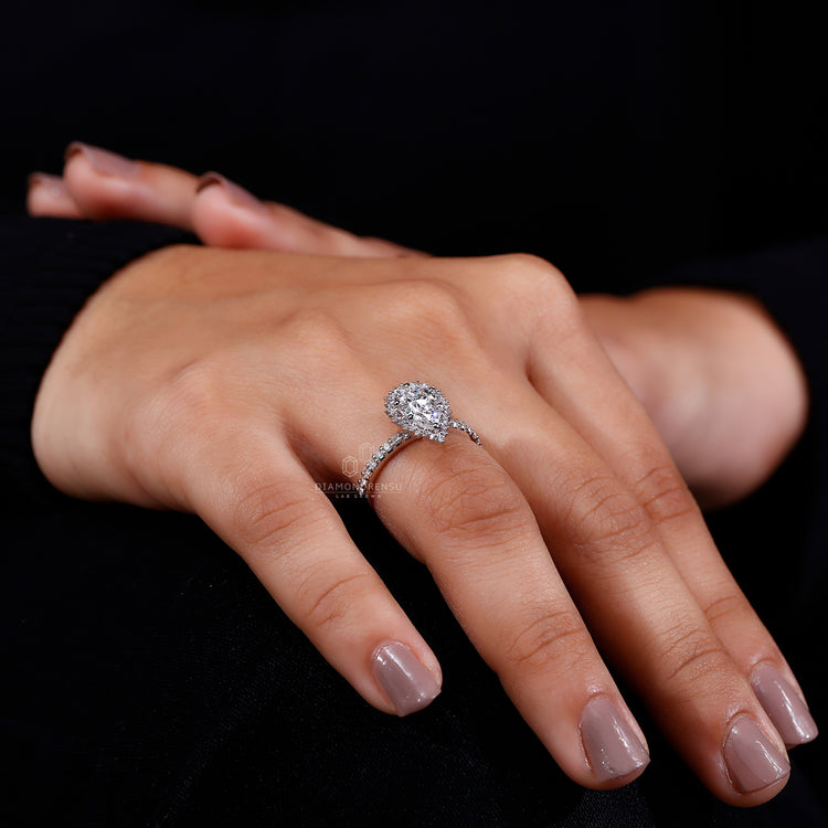 IGI certified with round cut diamond halo ring.
