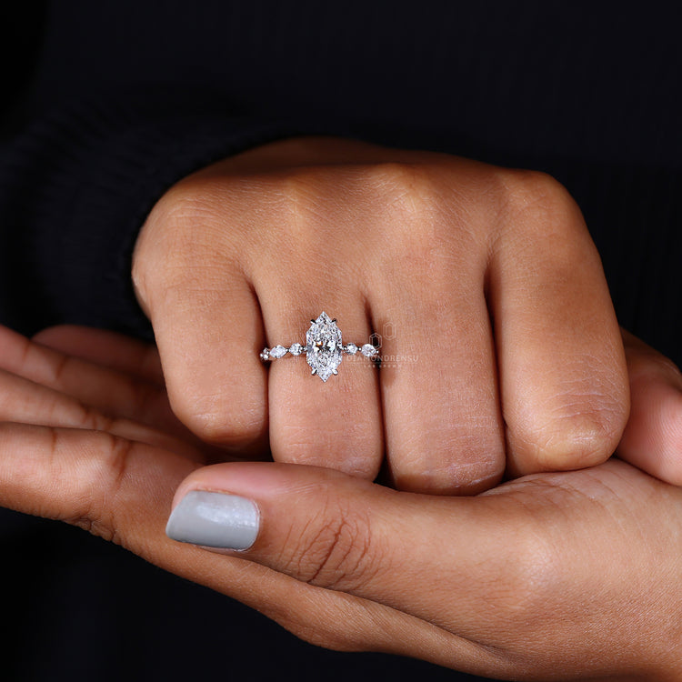 customise ring with shared prong side detail.
