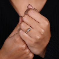 Round cut pave setting on yellow gold engagement ring.
