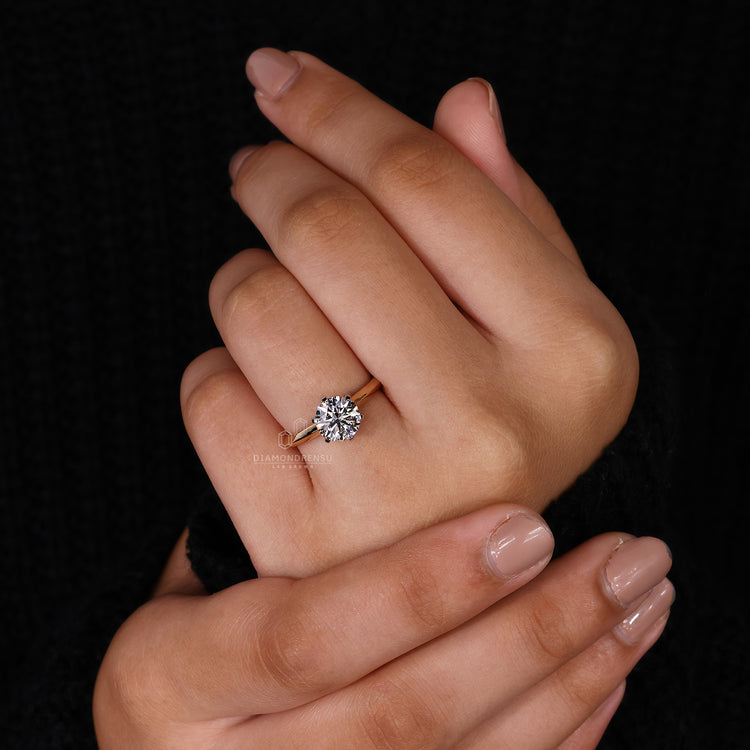 Custom diamond ring crafted with a knife edge shank and IGI certified stone.
