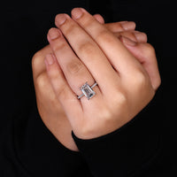 emerald cut ring with pave setting band.

