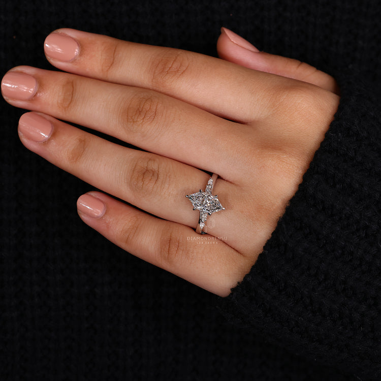 White gold ring with bridge accent style.
