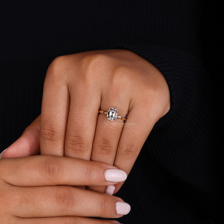 Lab grown diamond ring with hidden halo and compass prongs.
