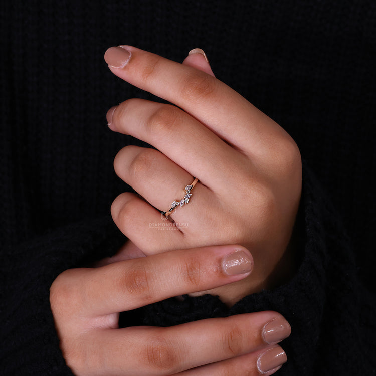 Yellow gold wedding band with marquise wedding band.
