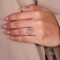 Yellow gold engagement ring in solitaire engagement ring style.
