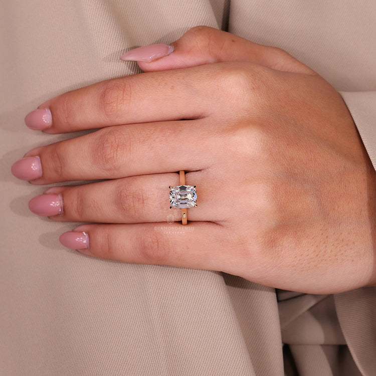 Yellow gold engagement ring in solitaire engagement ring style.
