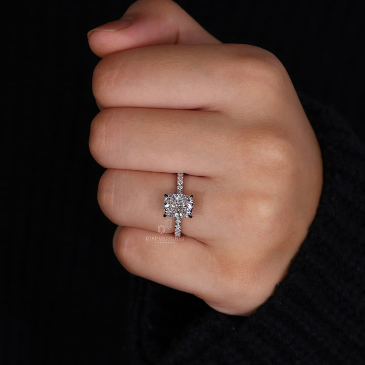 White gold engagement ring with 4 claw prong setting.
