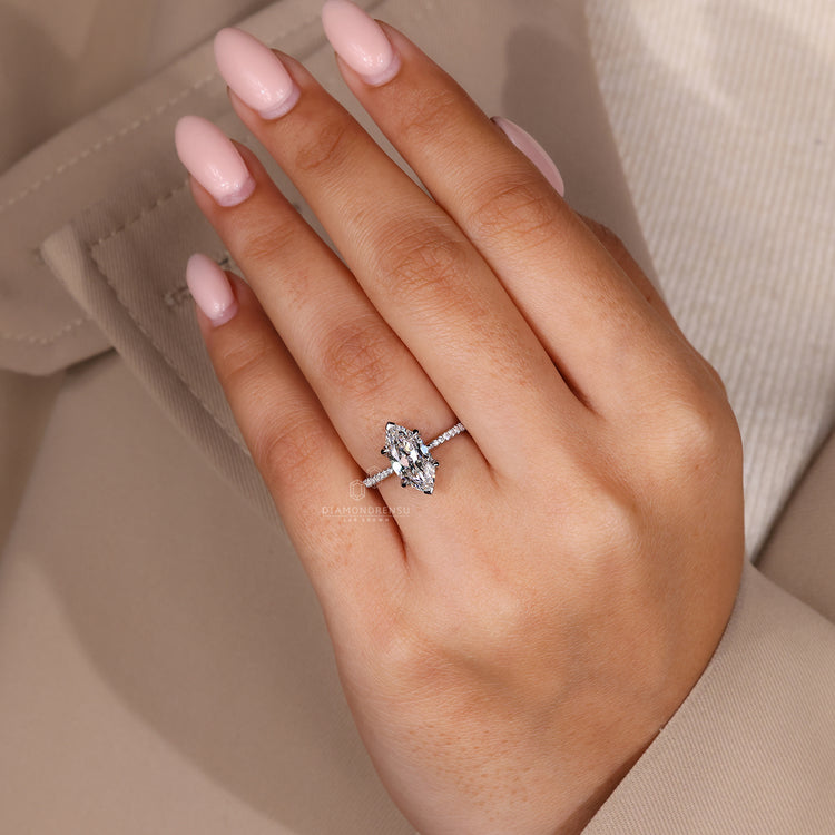 Lab grown diamond ring in a white gold round pave setting.
