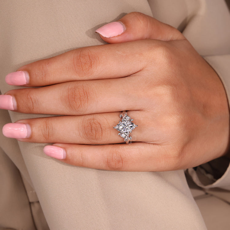 Unique marquise cut ring with side stones.
