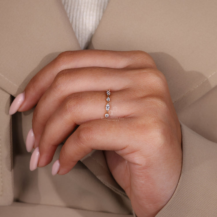 Marquise and round diamond wedding band.
