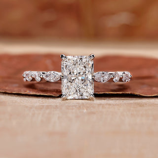 This is a radiant cut diamond ring for a shiny look.
