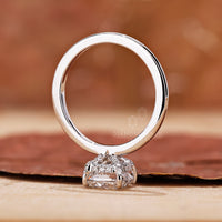 solitaire engagement ring with cushion cut diamond.

