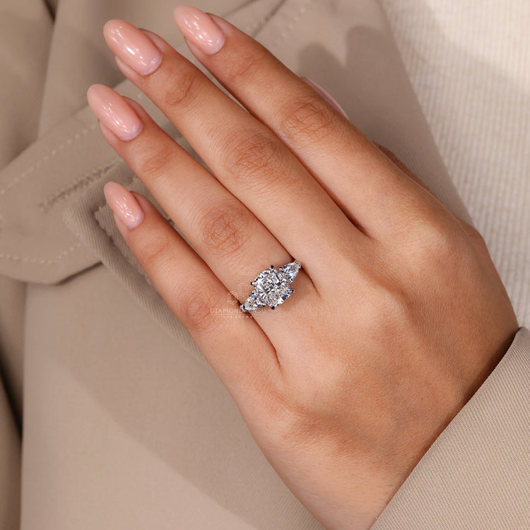 IGI certified pear side stone added.
