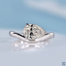 Pear Curved Solitaire East West Ring 1.24 CT