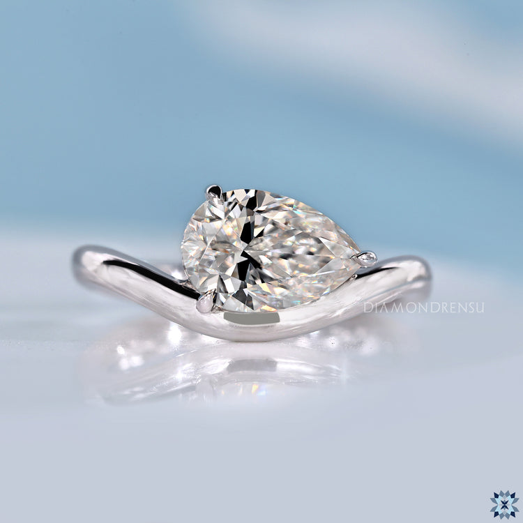 Pear Moissanite Curved Solitaire East West Ring 1.24 CT