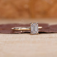 Buy engagement ring with emerald cut diamond ring.
