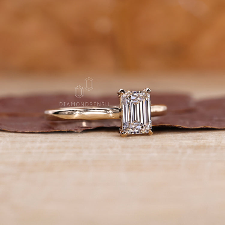 Buy engagement ring with emerald cut diamond ring.
