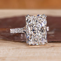 Handmade ring with radiant cut diamond and pave design.