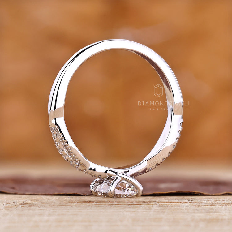 Buy Engagement ring made with twisted pave band.
