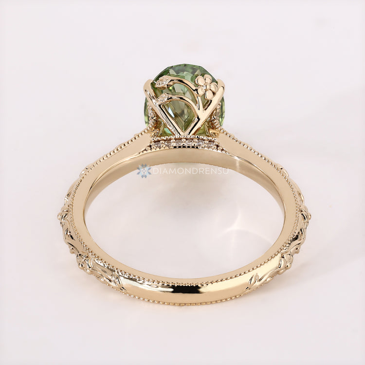 Handmade oval diamond ring with Art Deco details.