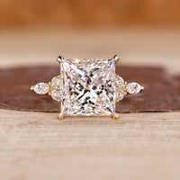 Princess Cut Diamond Ring with marquise side stones.
