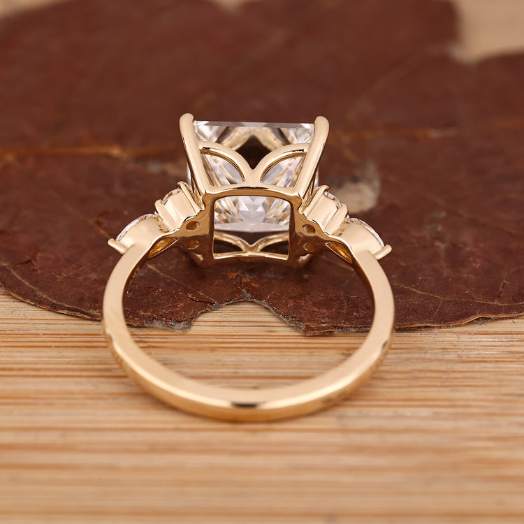 Princess Cut Diamond Ring with round diamond accents.
