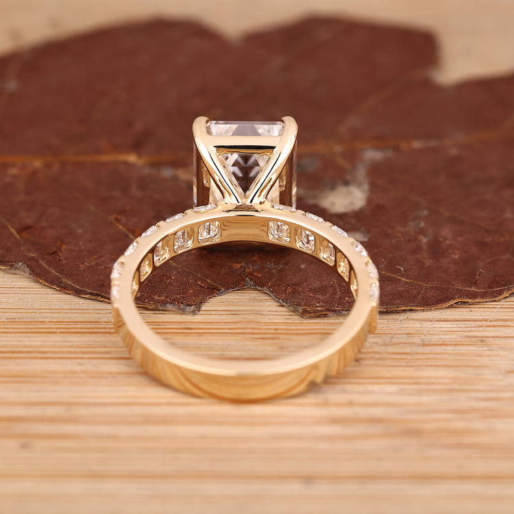 Emerald Cut Engagement Ring with emerald cut accents.
