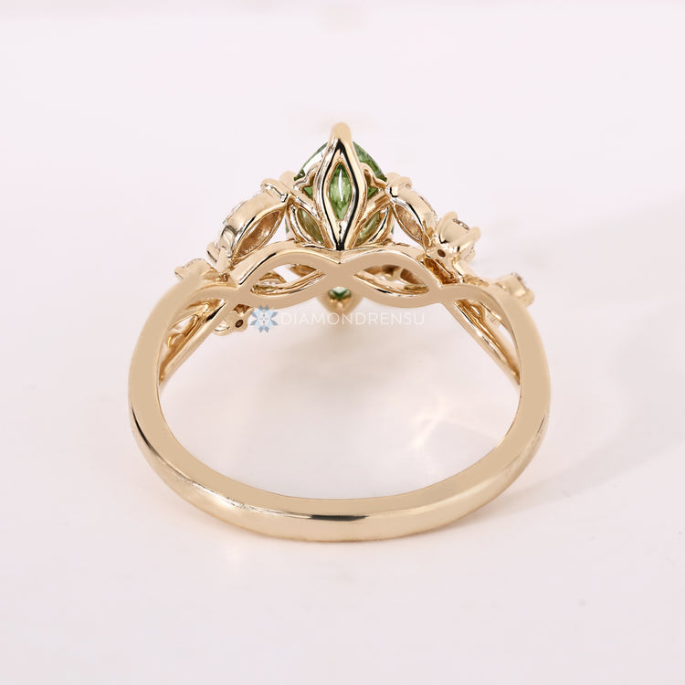 Handmade green diamond ring with tulip basket.