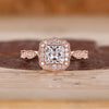 Princess Cut Diamond Ring with pave round diamonds.
