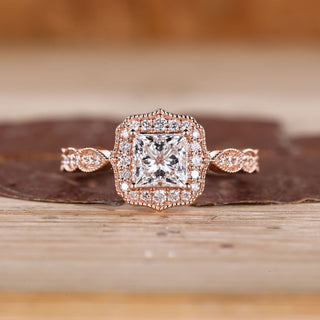 Princess Cut Diamond Ring with pave round diamonds.

