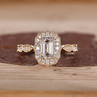 Emerald Cut Diamond Ring with pave round diamonds.
