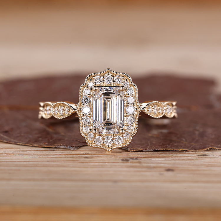 Emerald Cut Diamond Ring with pave round diamonds.

