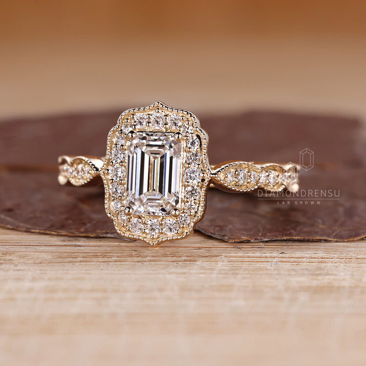 Emerald Cut Diamond Ring with milgrain detailing.
