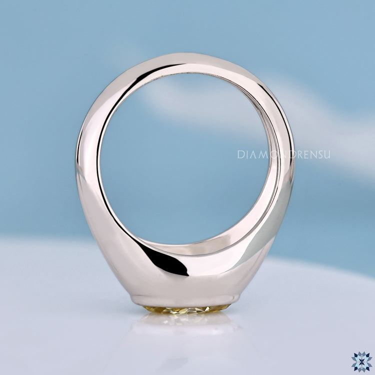 Handmade oval cut engagement ring in classic solitaire style.