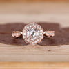 Hexagon Cut Diamond Ring with pave round diamonds.
