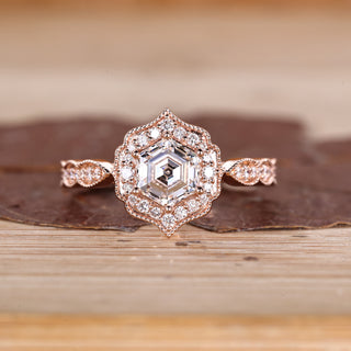 Hexagon Cut Diamond Ring with pave round diamonds.
