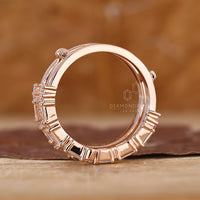 Handmade jewelry with baguette wedding band.
