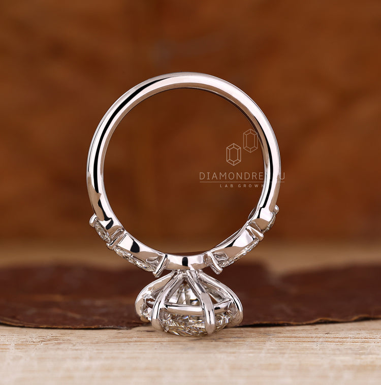 Handmade jewellery 5 stone diamond ring with shared prong setting.