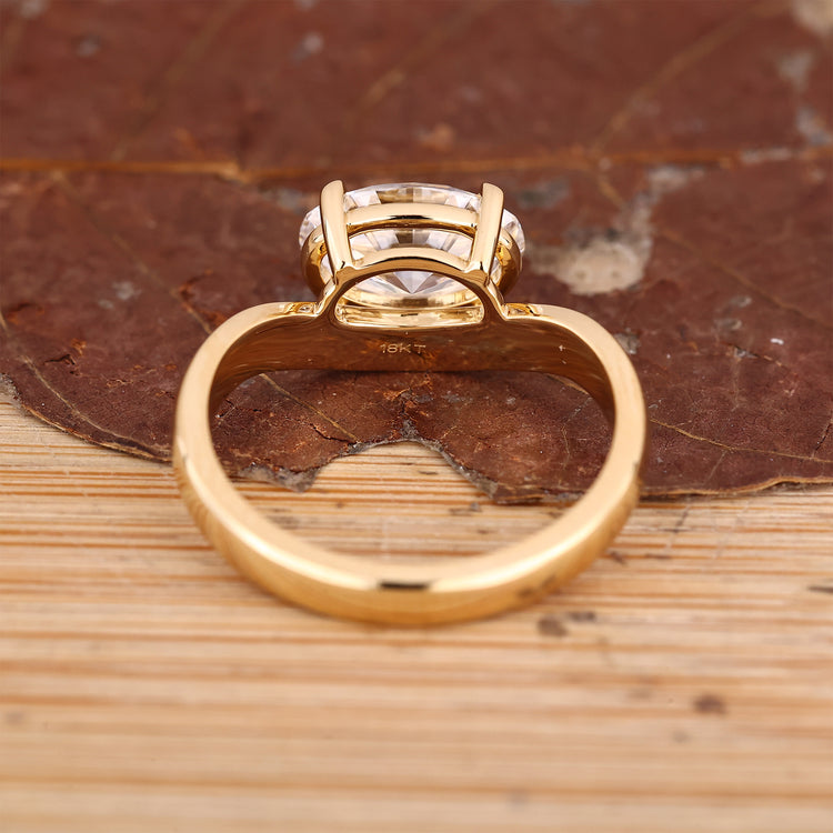 Oval lab grown diamond engagement ring with fluid wave shank