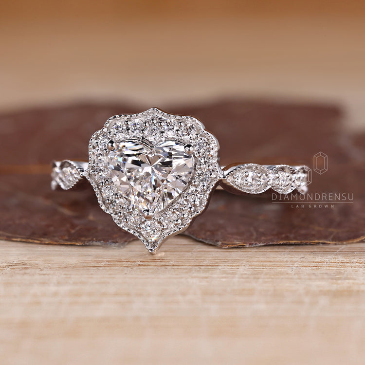 Heart Cut Diamond Ring with milgrain detailing.