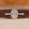 Halo Engagement Ring with oval cut lab grown diamond.
