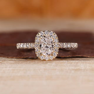 Halo Engagement Ring with oval cut lab grown diamond.
