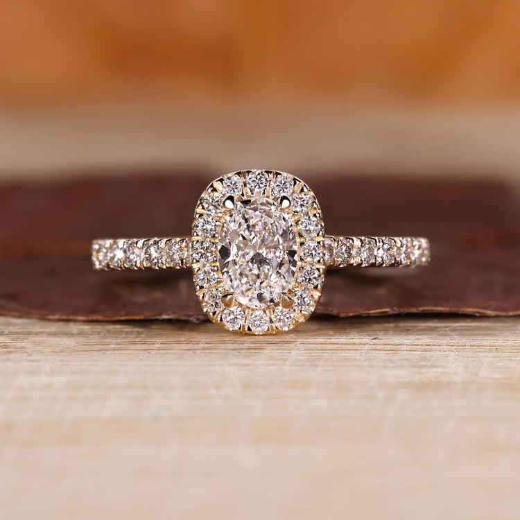 Halo Engagement Ring with oval cut lab grown diamond.
