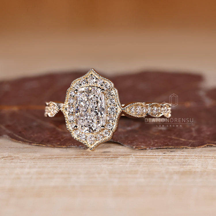Cushion Cut Diamond Ring with milgrain detailing.
