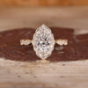Marquise Diamond Ring with pave round diamonds.
